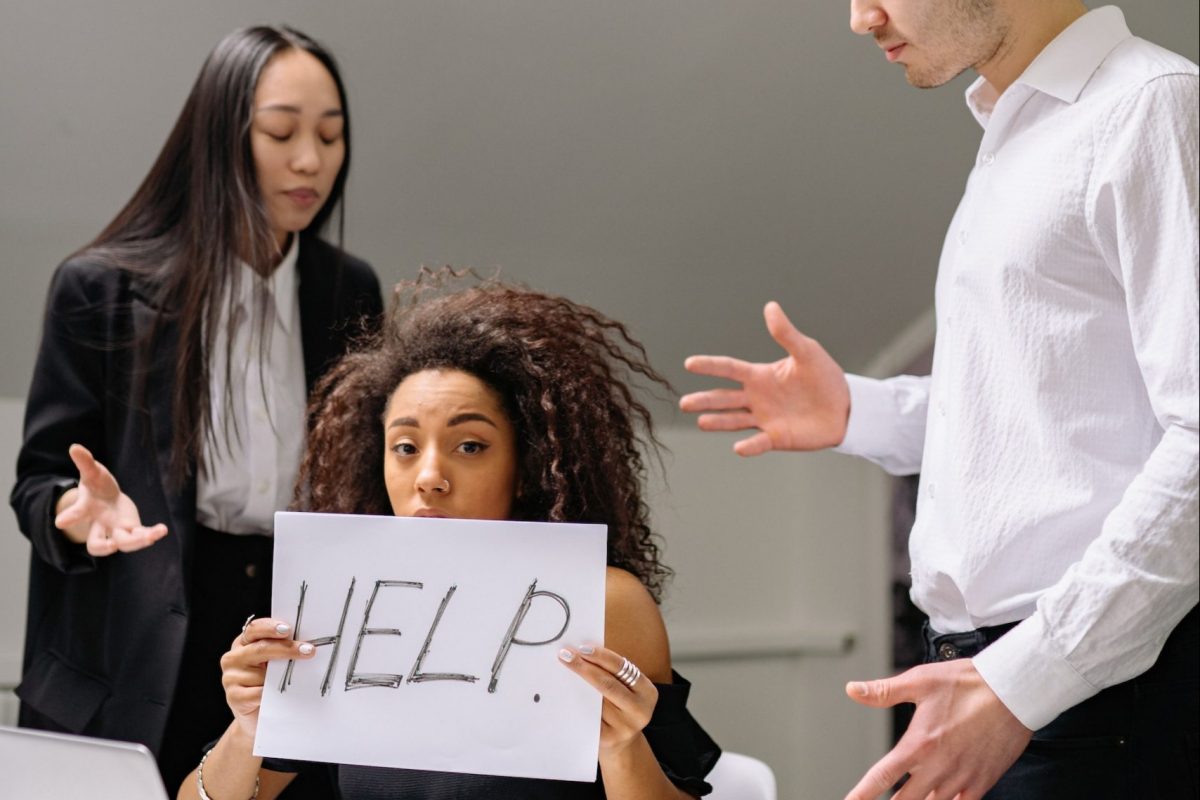 Women asking for help at work